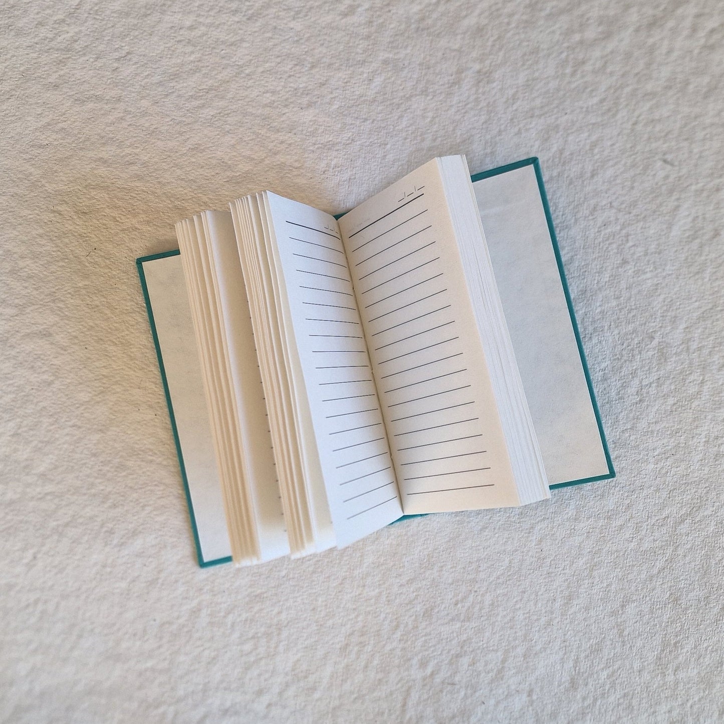 A Small Notebook Turquoise Art Deco