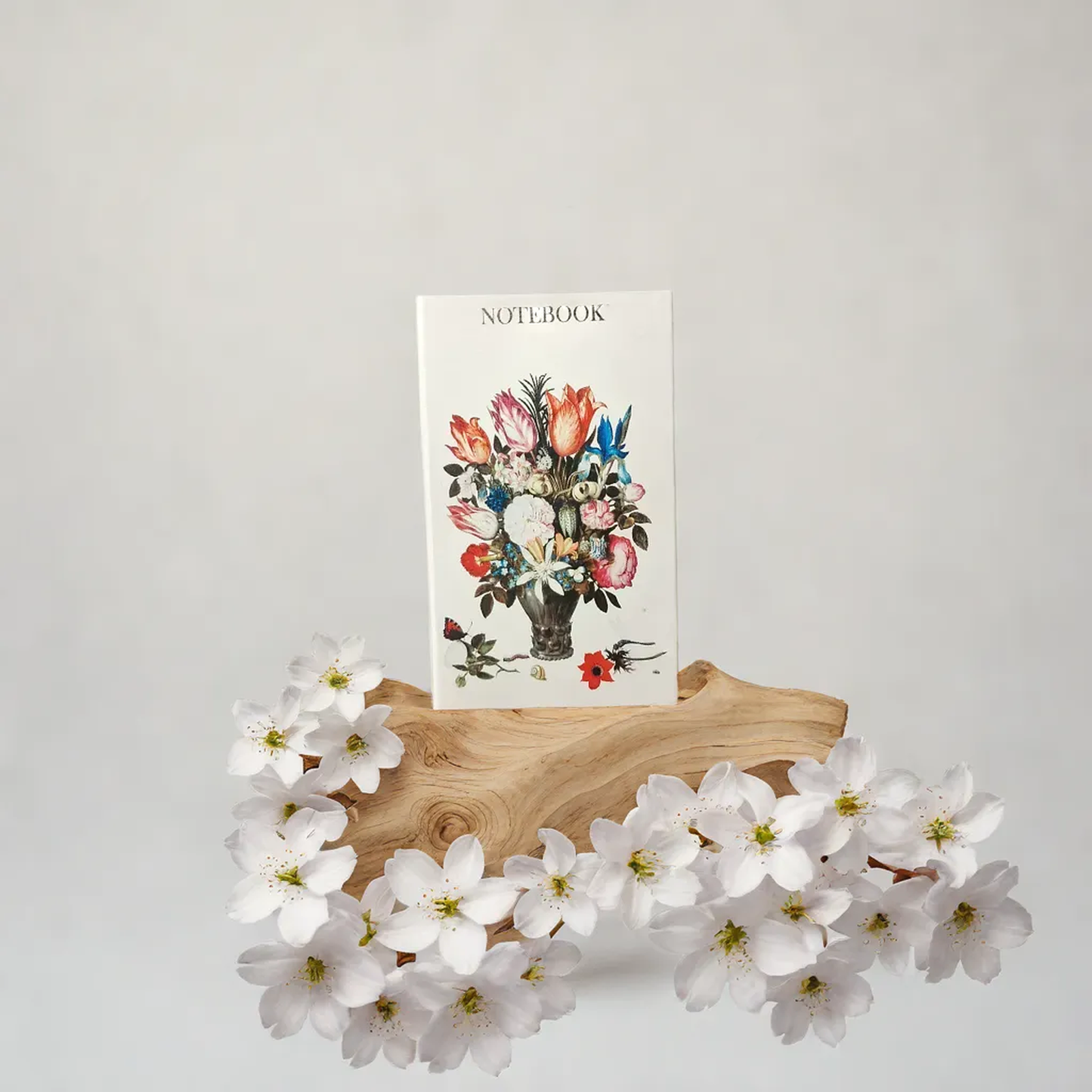 A Small Notebook Flowers in a Vase