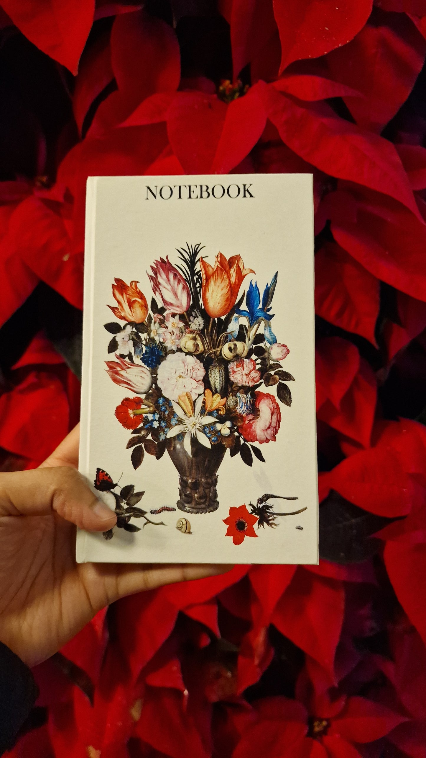 A Small Notebook Flowers in a Vase