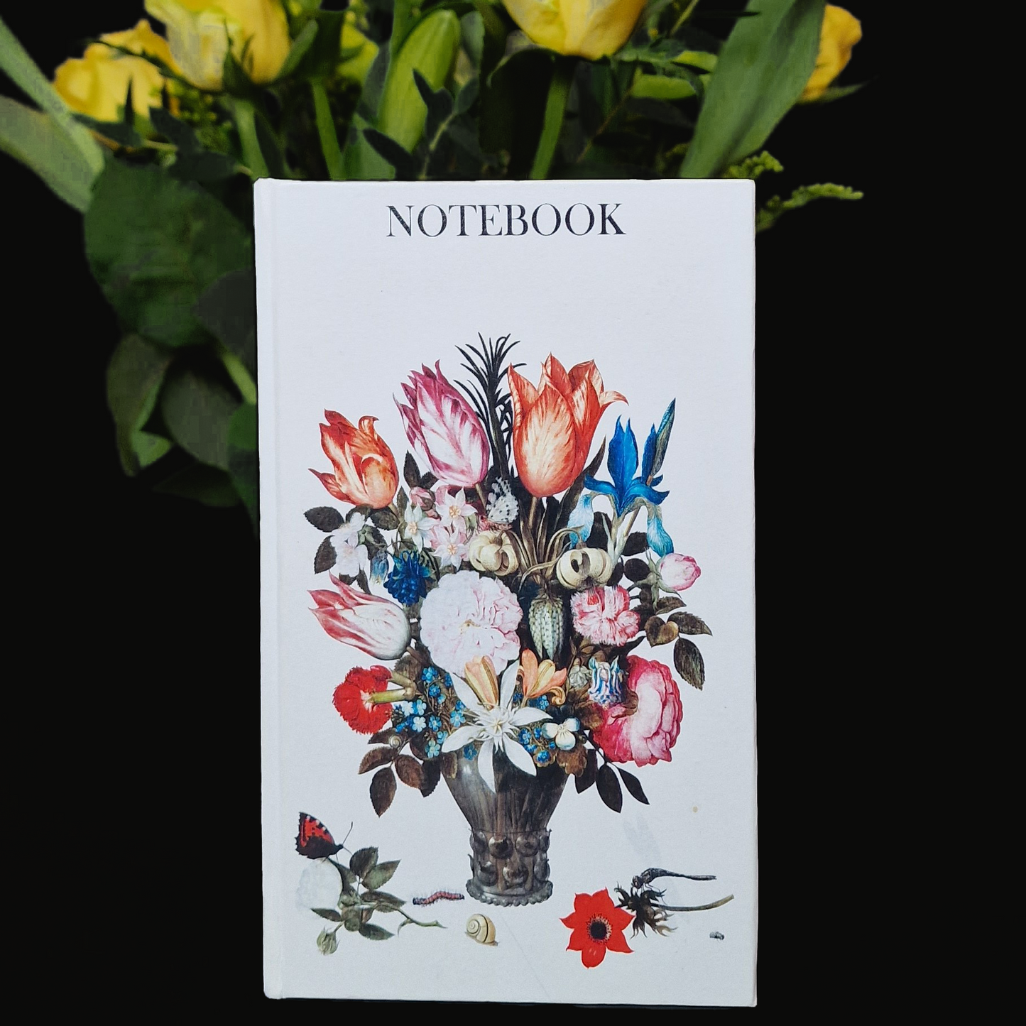 A Small Notebook Flowers in a Vase